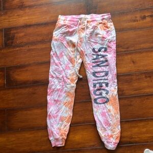 One pair of kids tie-dye sweat pants that say San Diego on the side.